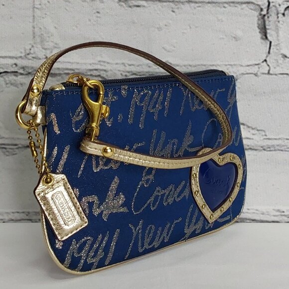 'COACH' 'POPPY' SIGNATURE SCRIPT LUREX JACQUARD WRISTLET NAVY BLUE/GOLD - Picture 2 of 15